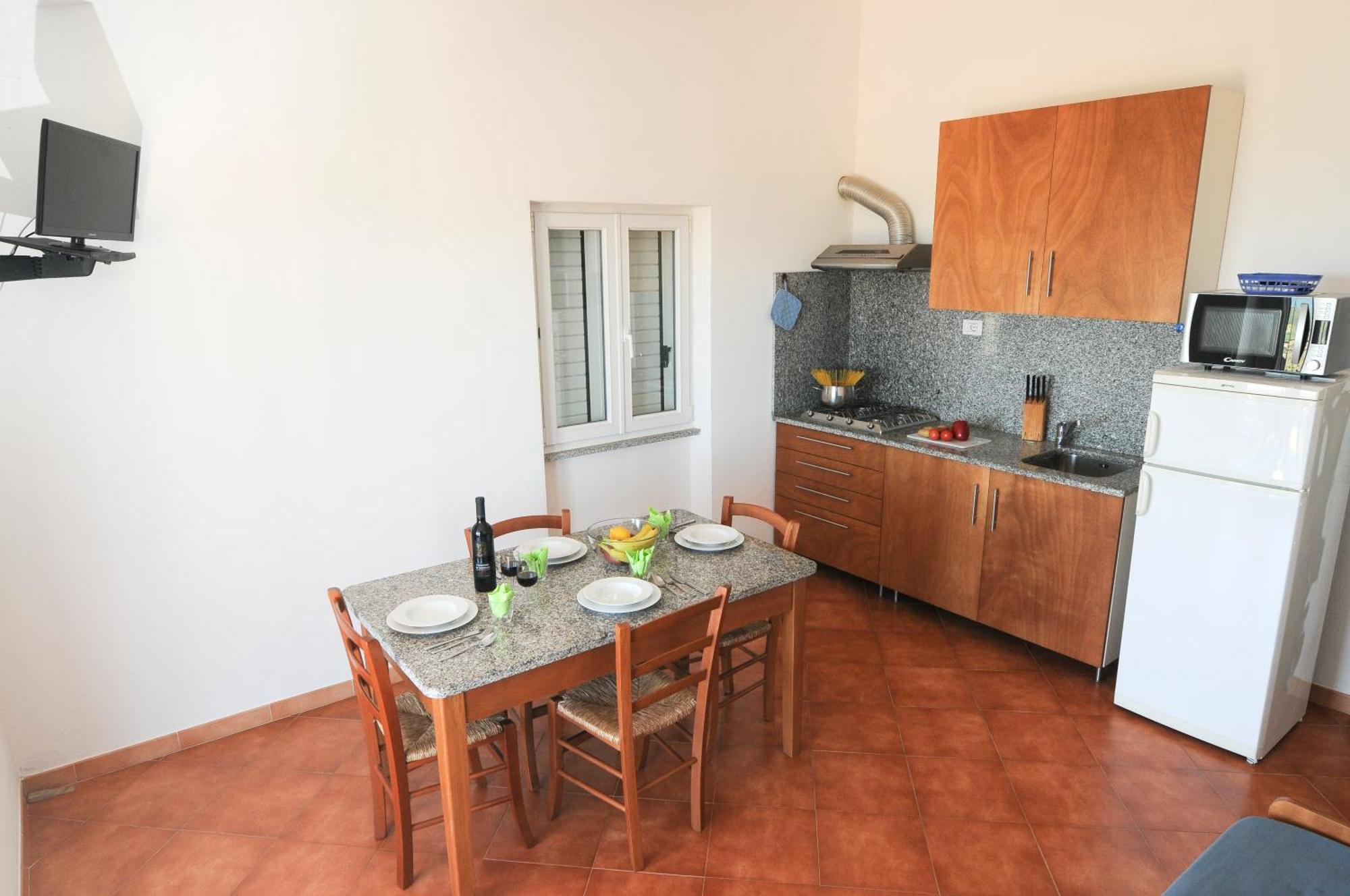 Gf Apartments Li Seddi Badesi Buitenkant foto